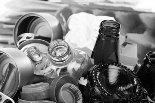 Team clearing a garden area in Southwark with tools